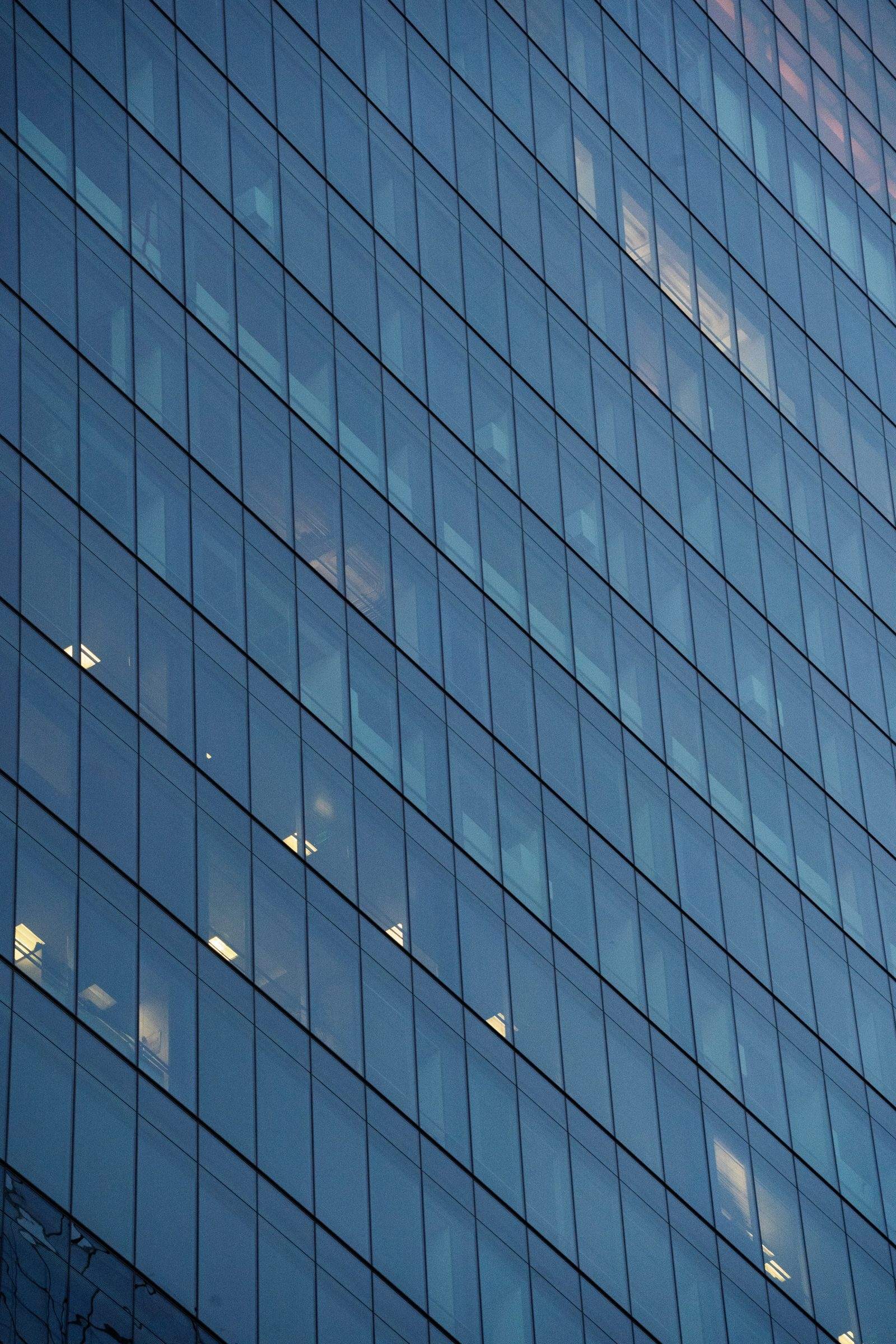 Abstract glass office facade suggesting structure and governance